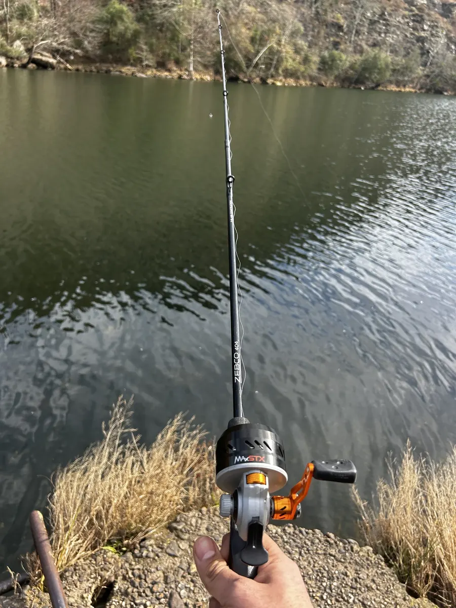 Casting a fishing rod beside a stream